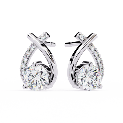 Pear and Round Cut Diamond Stud Earrings Close-Up Detail