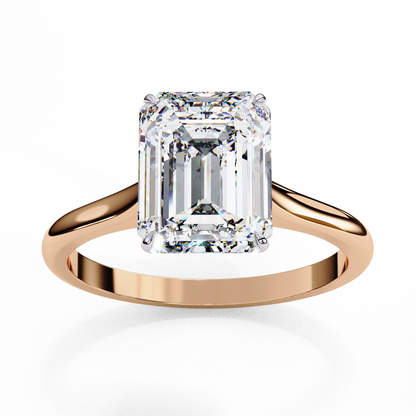 Angled view of emerald cut diamond solitaire ring with polished finish