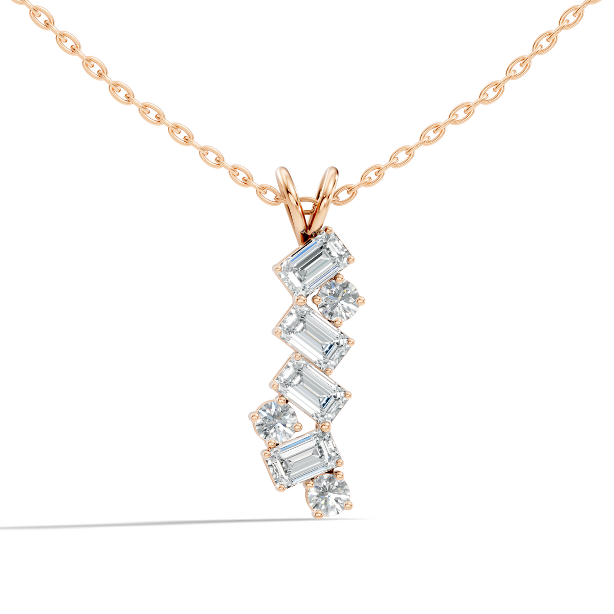 Yellow gold vertical pendant necklace with emerald and round diamond design