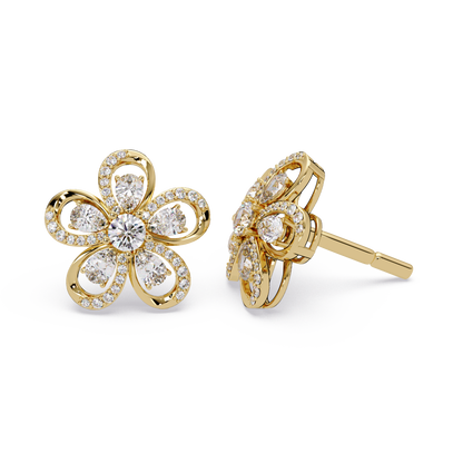 Floral inspired diamond stud earrings with pear accent arrangement