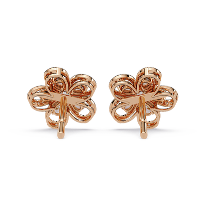 Close up of floral loop stud earrings with pear cut lab grown diamonds