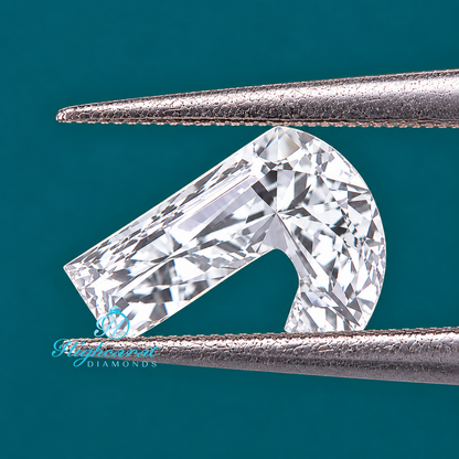 Close-up of J letter shape diamond
