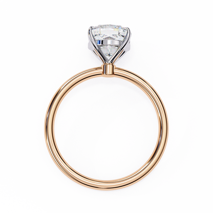 Close up of cushion cut solitaire ring with refined prong details