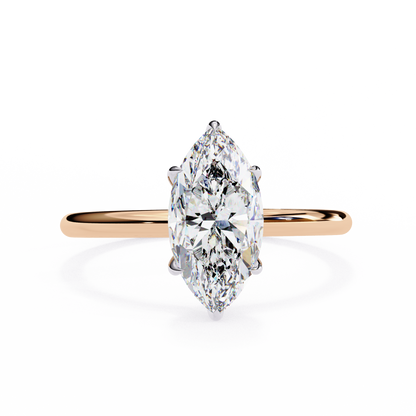 Close up of marquise cut solitaire diamond ring with detailed prong finish