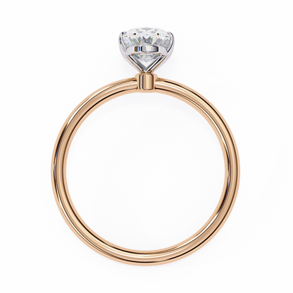 Close up of oval cut solitaire ring with refined prong details