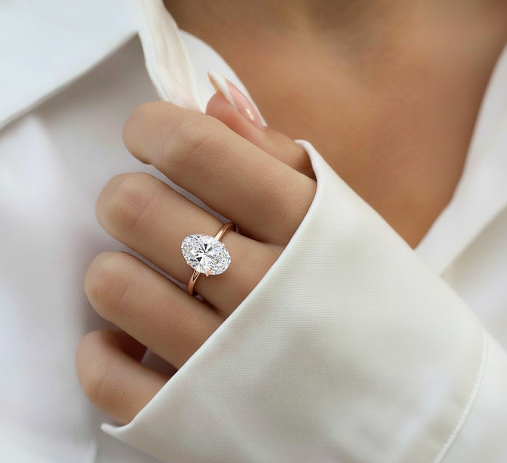 360 view video of lab grown oval cut diamond solitaire ring rotating on white background
