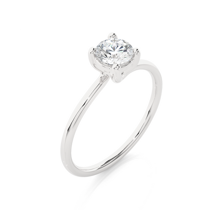 Hand wearing round brilliant cut lab grown diamond ring