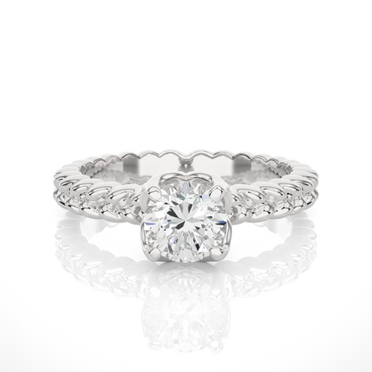 Minimalist Twisted Ring featuring round lab grown diamond center stone
