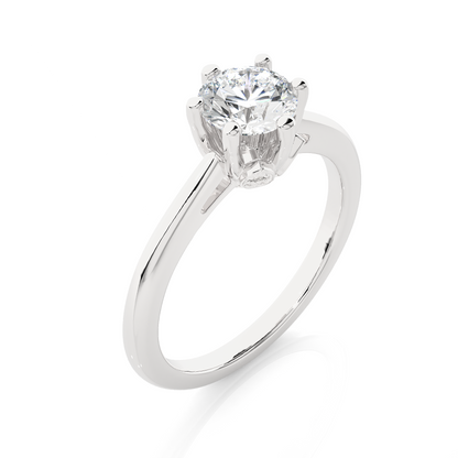 Hand wearing round shape lab grown diamond engagement ring