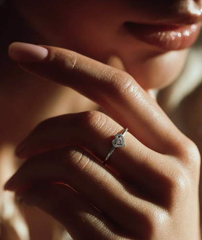 Angled view of round cut diamond proposal ring with clean finish