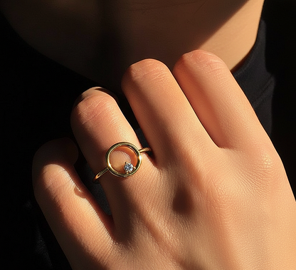 Angled view of round cut solitaire ring with clean finish