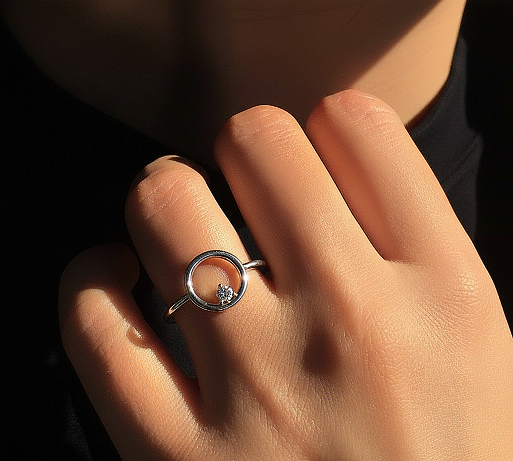 360 view video of minimalist lab grown round cut diamond gift ring rotating on white background