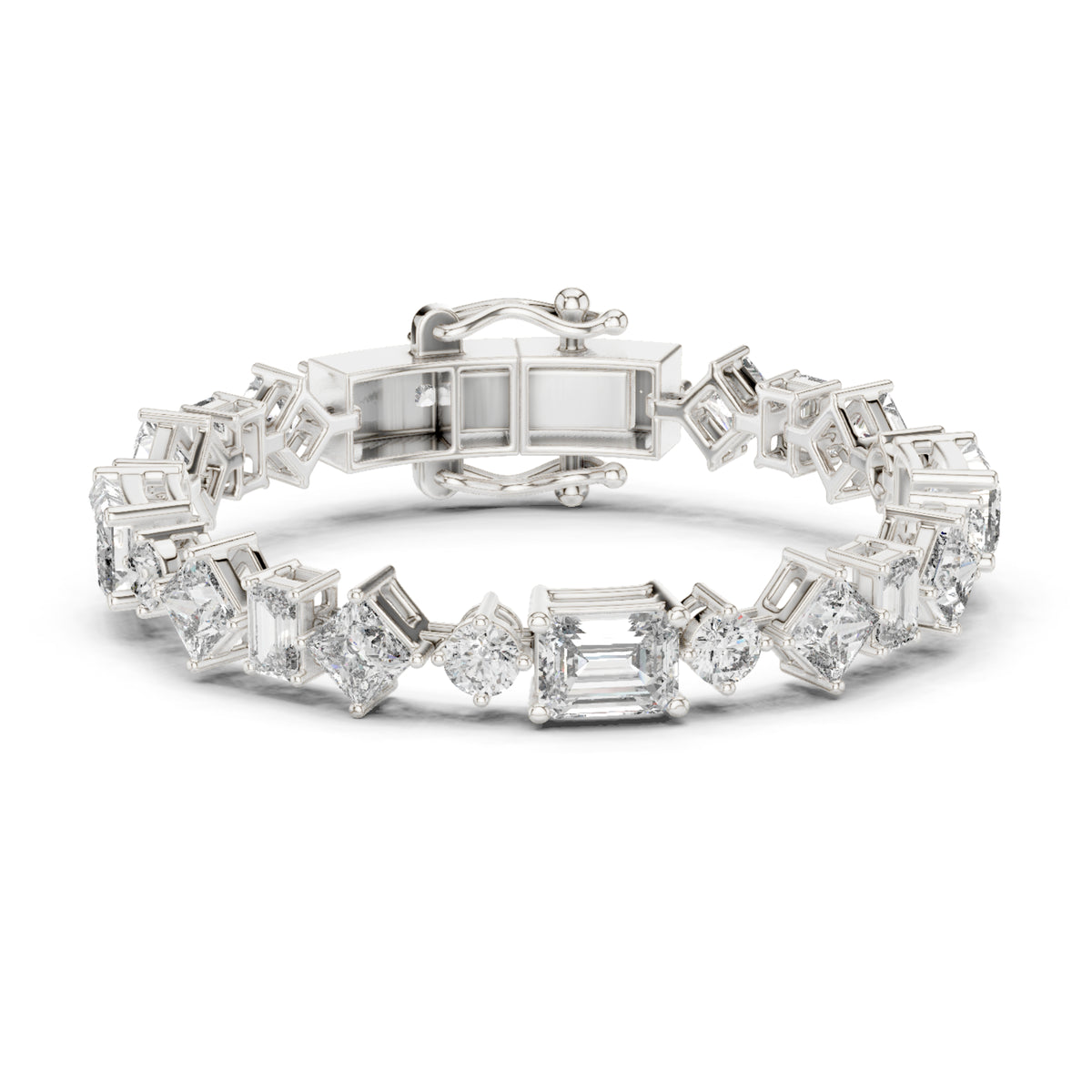 White gold tennis bracelet with emerald, princess and round cut diamonds
