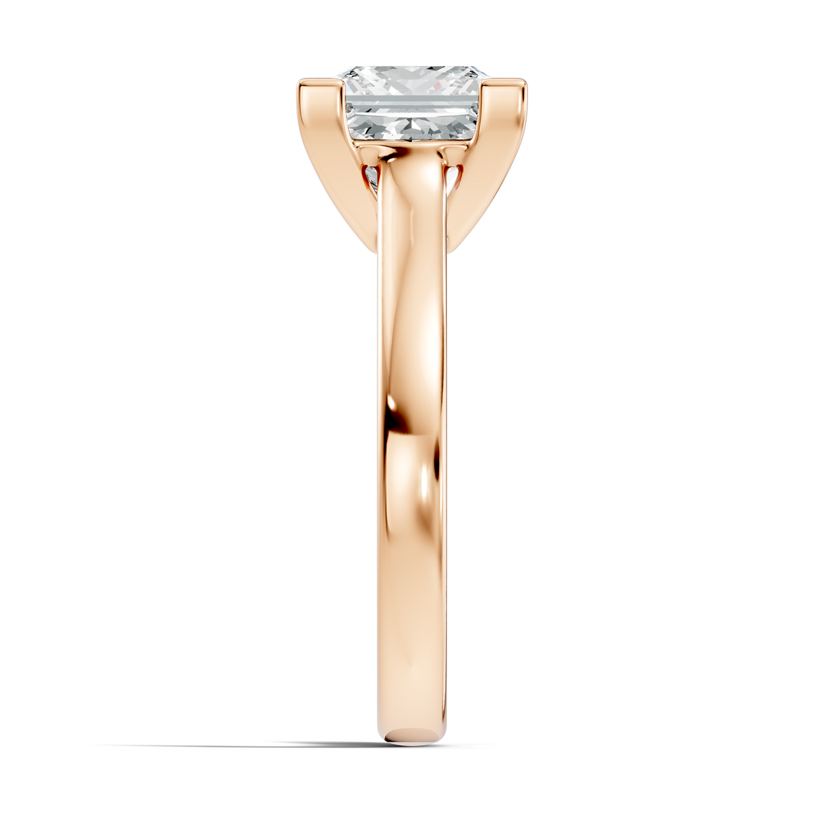 Close up of princess cut solitaire ring with refined prong details