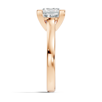 Close up of princess cut solitaire ring with refined prong details