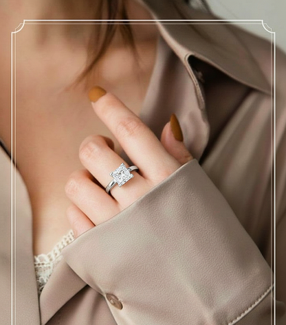Hand wearing princess shape solitaire lab diamond ring