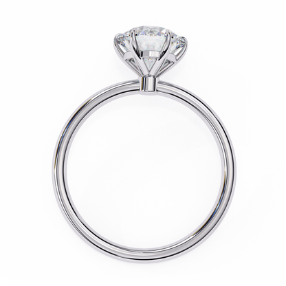 Close up of round cut solitaire diamond ring with detailed prong finish
