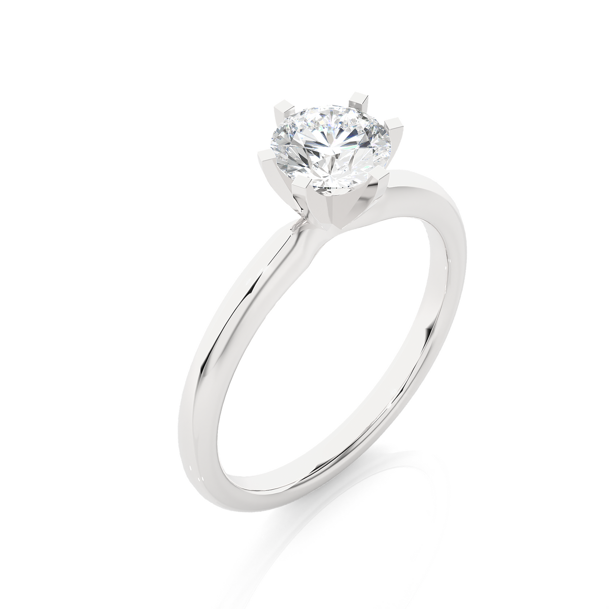 Close up of round cut solitaire ring with refined prong details