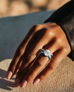 Hand wearing round shape open twist lab diamond ring