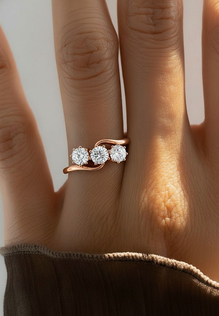 Hand wearing round cut lab diamond crossover ring with curved band #wearthelook