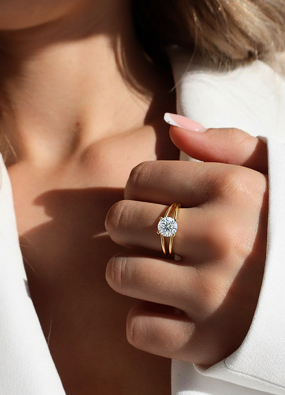 Angled view of round cut diamond cluster ring with polished finish