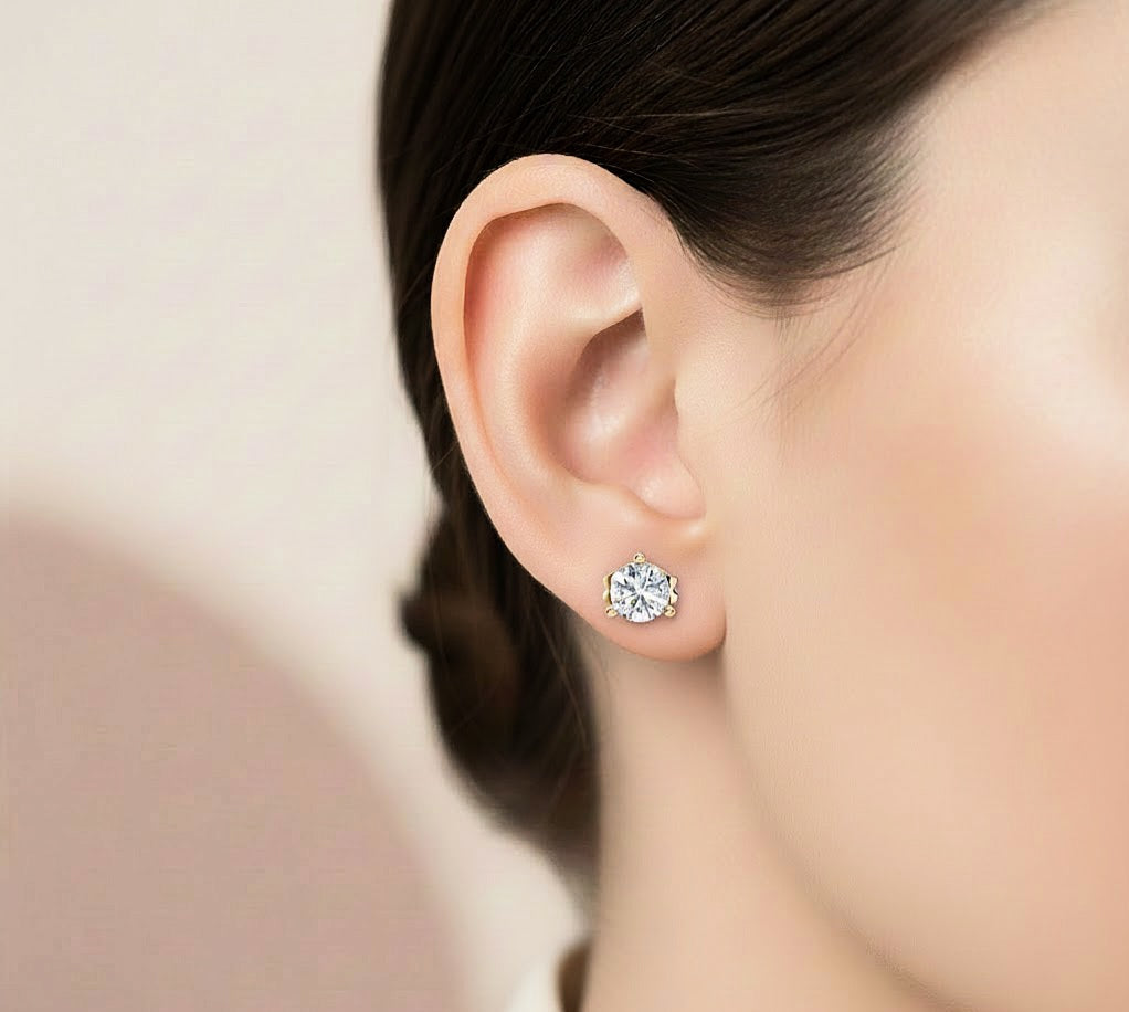 Hand and ear styling look of round cut solitaire diamond studs