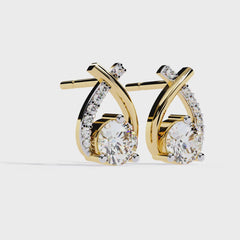 Pear and Round Cut Diamond Earrings Close-Up Showing Facet Details