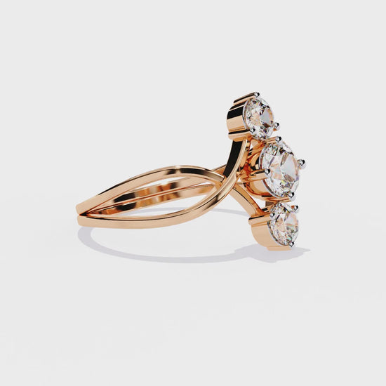 360 view of round three stone diamond ring rotating on white background