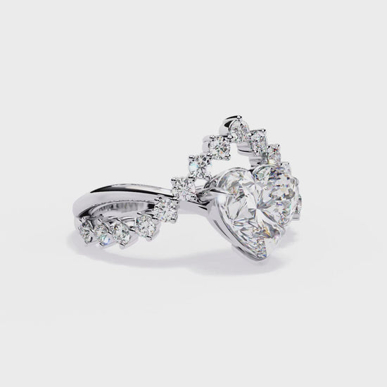 360 view video of heart shape lab diamond ring with crown style side stones rotating